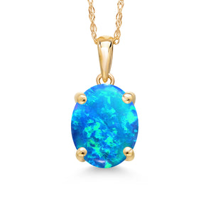 Blue Simulated Opal - October_Pendant in 14K Yellow Gold