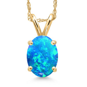 Blue Simulated Opal-Cabochon - October_Pendant in 14K Yellow Gold