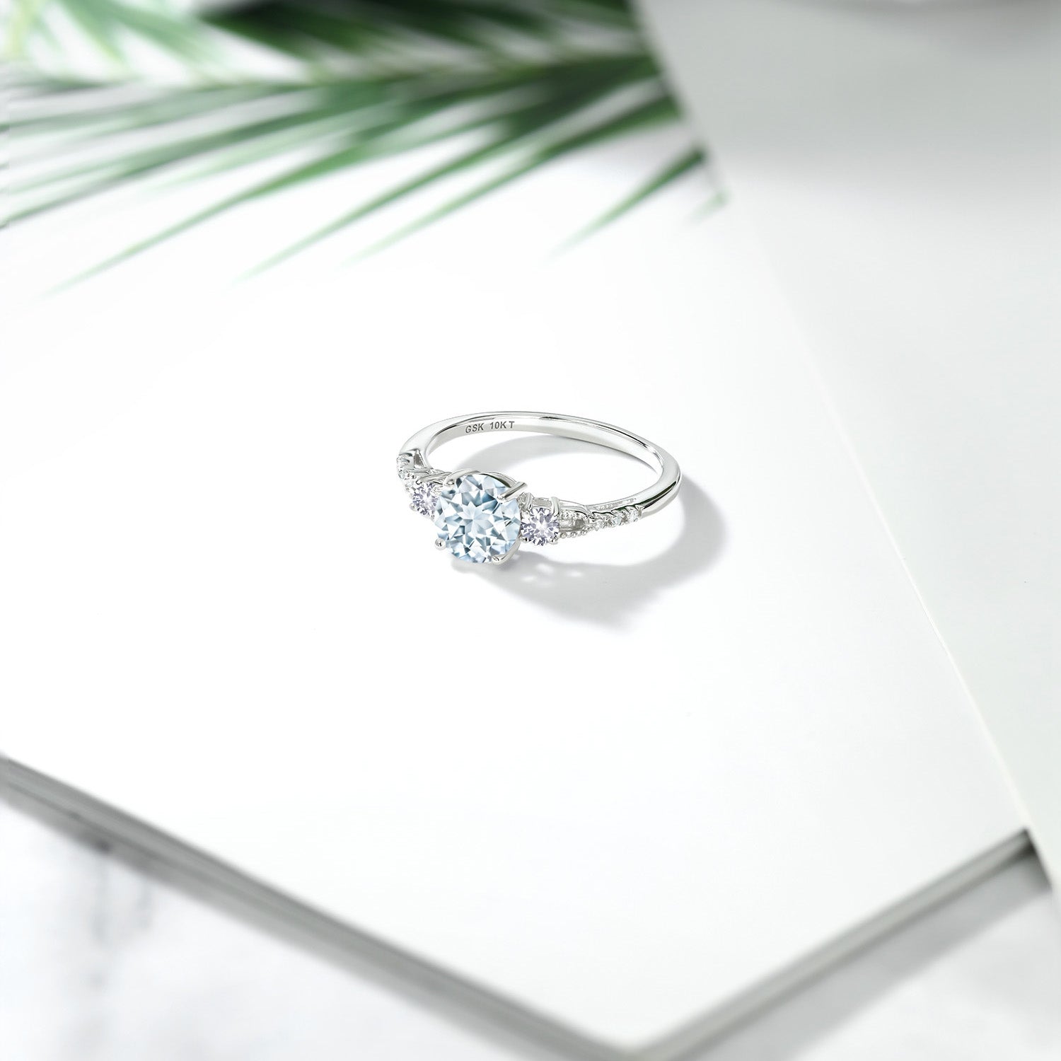 10K White Gold Sky Blue Aquamarine White Created Sapphire and White Diamond Accent 3-Stone Engagement Ring For Women | 0.89 Cttw | Round 6MM | Available In Size 5-9.5