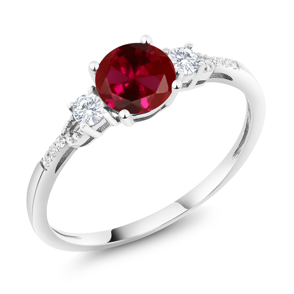 Gem Stone King 10K White Gold Red Created Ruby White Created Sapphire and White Diamond Accent 3-Stone Engagement Ring For Women (1.14 Cttw, Round 6MM, Gemstone July Birthstone)