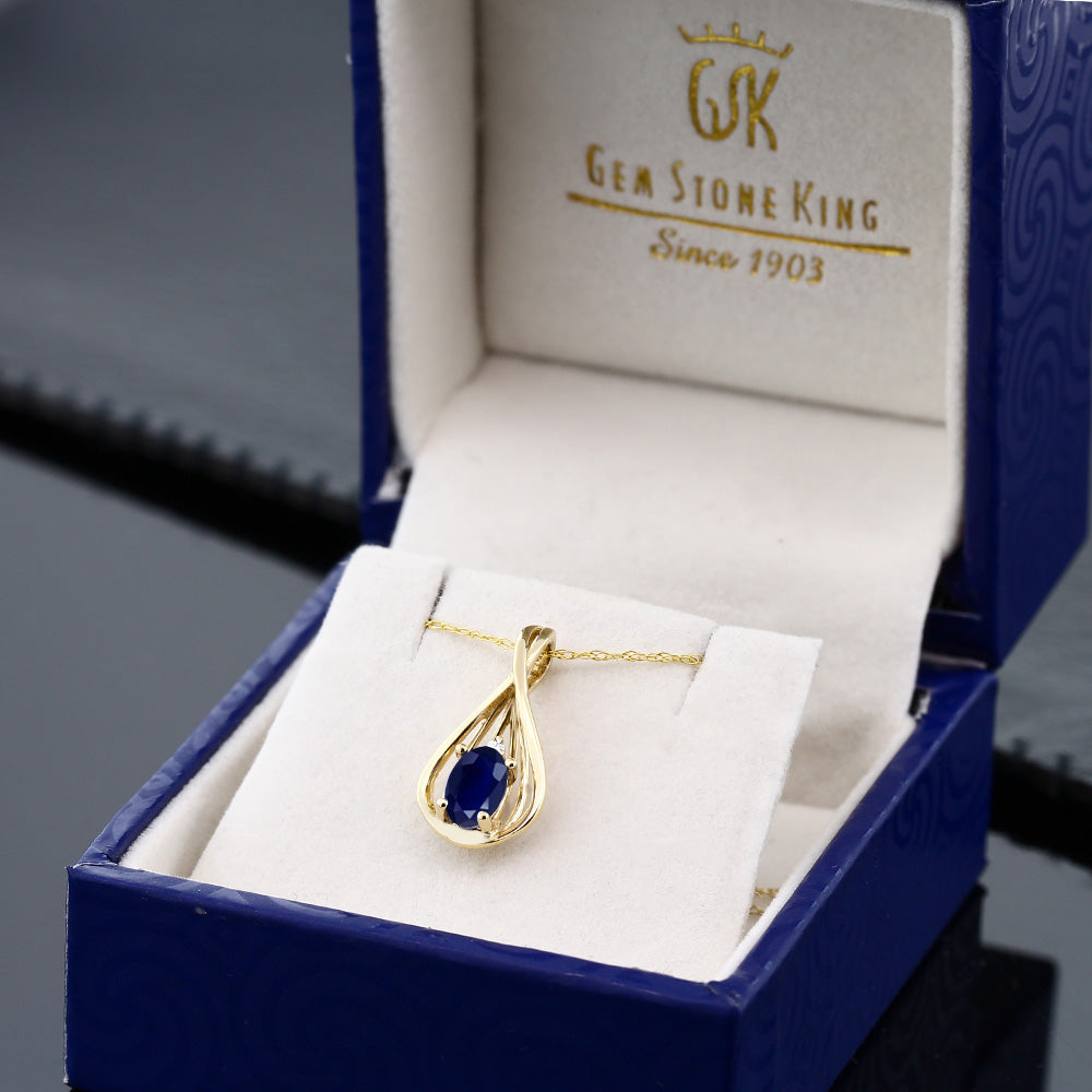 10K Yellow Gold Blue Sapphire and White Diamond Teardrop Pendant Necklace For Women (0.55 Cttw, Gemstone September Birthstone, Oval 6X4MM, with 18 Inch Chain)