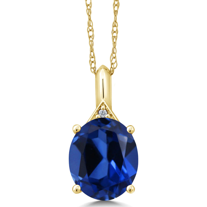 Blue Created Sapphire - September_Pendant in 10K Yellow Gold