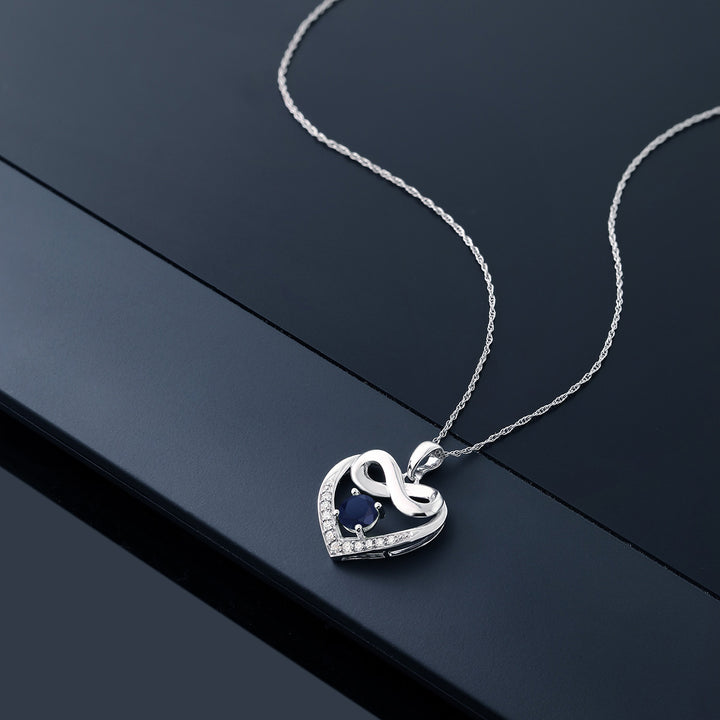 10K White Gold Blue Sapphire and White Lab Grown Diamond Heart and Infinity Pendant Necklace For Women (1.02 Cttw, Round 5MM, with 18 Inch Silver Chain)