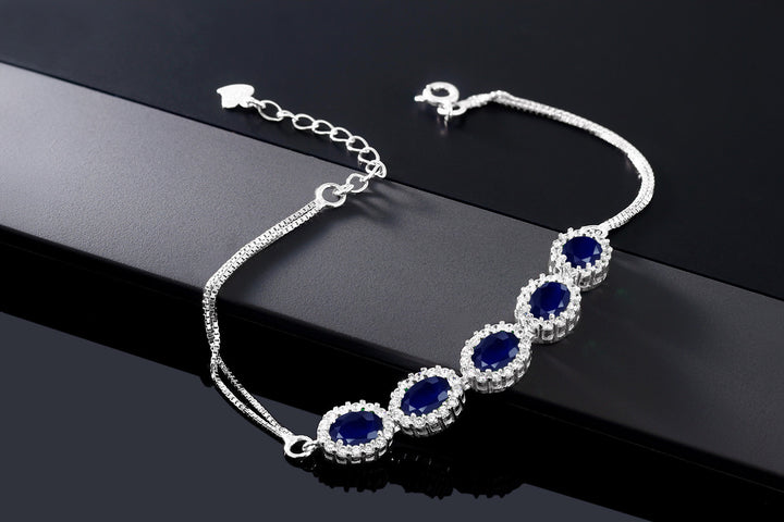 925 Sterling Silver Blue Sapphire Tennis Bracelet For Women (6.14 Cttw, Gemstone Birthstone, Center Stones: 7X5MM, 7 Inch + 1.5 inch Extender)