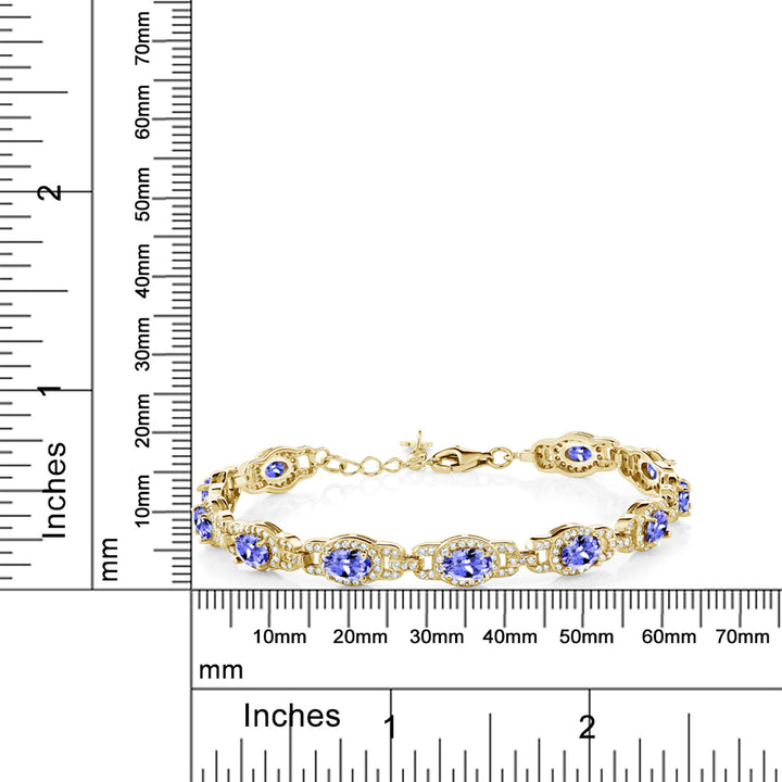 18K Yellow Gold Plated Silver Blue Tanzanite Tennis Bracelet For Women (8.55 Cttw, Oval 6X4MM, Gemstone Birthstone, 7 Inch With 1 Inch Extender)