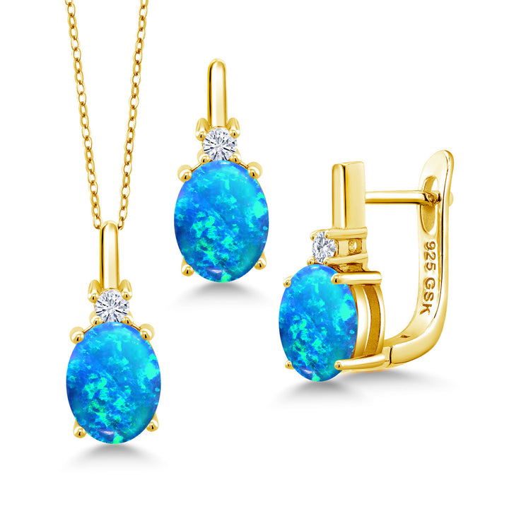Blue Simulated Opal-Cabochon - October_Pendant Earrings Set in 925 Yellow Gold Plated Silver