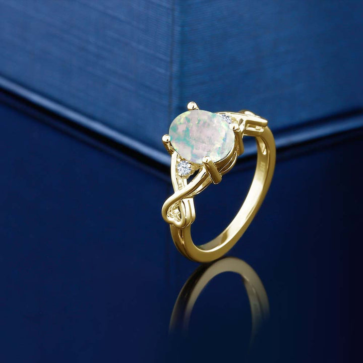 18K Yellow Gold Plated Silver Cabochon White Simulated Opal Ring For Women | 0.69 Cttw | Oval 9X7MM | Available In Size 5, 6, 7, 8, 9