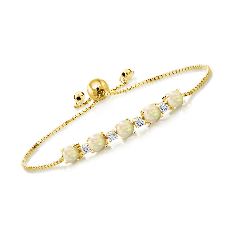 Gem Stone King 18K Yellow Gold Plated Silver Gemstone Birthstone and White Moissanite Tennis Bracelet for Women | Round 5MM and 2.5MM | Adjustable Bolo Design | Easy-On Easy-Off | Fully Adjustable Up to 9 Inch