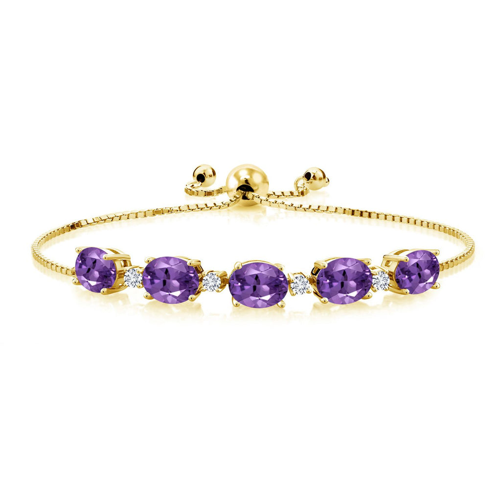 Gem Stone King 18K Yellow Gold Plated Silver Gemstone Birthstone and White Lab Grown Diamond Tennis Bracelet for Women | Oval 8X6MM with Round 2.5MM Accents | Adjustable Bolo Chain | Fine Jewelry for Her Mom Wife
