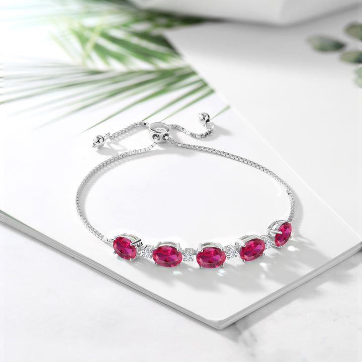 925 Sterling Silver Red Created Ruby and White Lab Grown Diamond Tennis Bracelet For Women (7.76 Cttw, Oval Center Stone:8X6MM, Small Stones: 2.5MM)