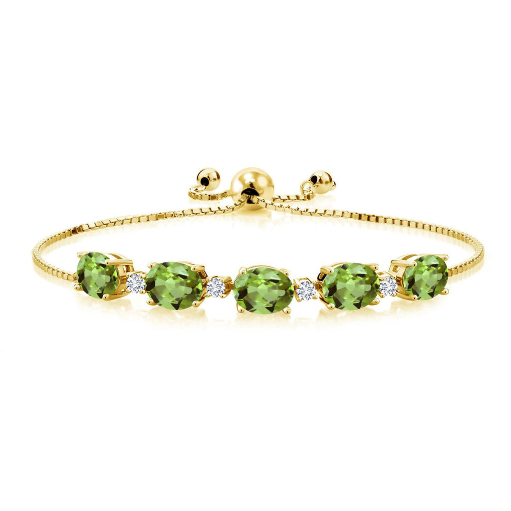 Gem Stone King 18K Yellow Gold Plated Silver Gemstone Birthstone and White Lab Grown Diamond Tennis Bracelet for Women | Oval 8X6MM with Round 2.5MM Accents | Adjustable Bolo Chain | Fine Jewelry for Her Mom Wife