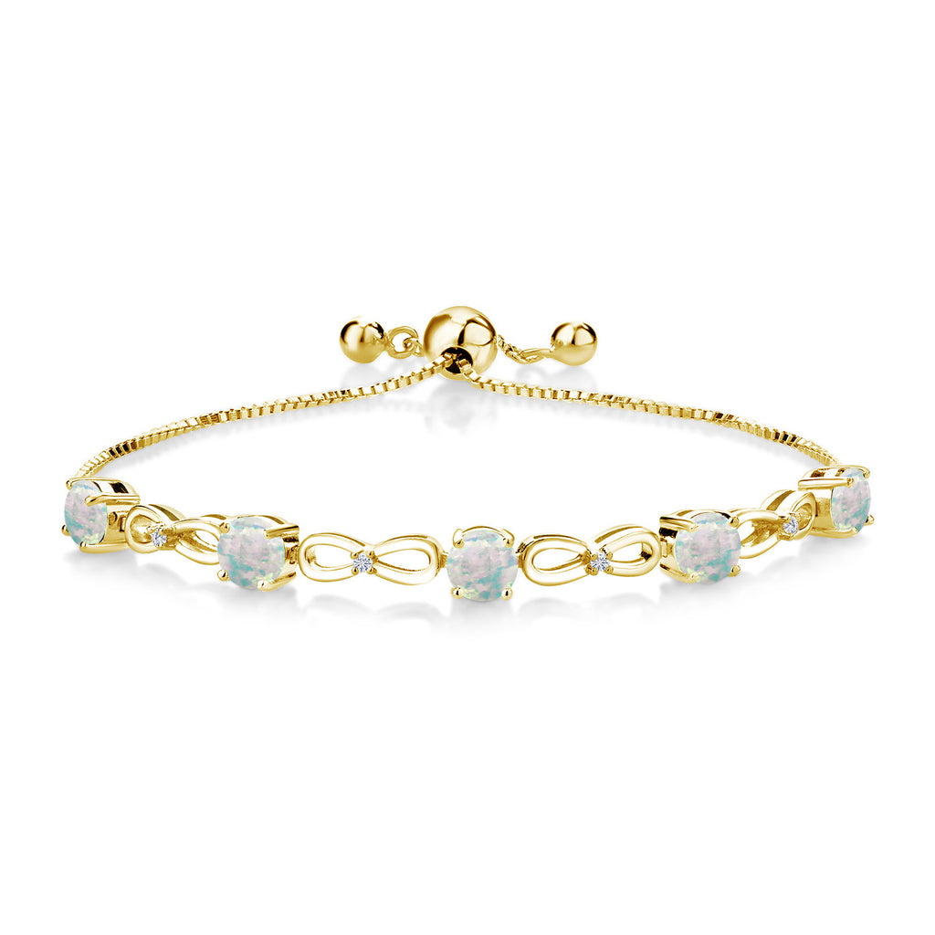 White Opal-Cabochon - October_Bracelet in 925 Yellow Gold Plated Silver