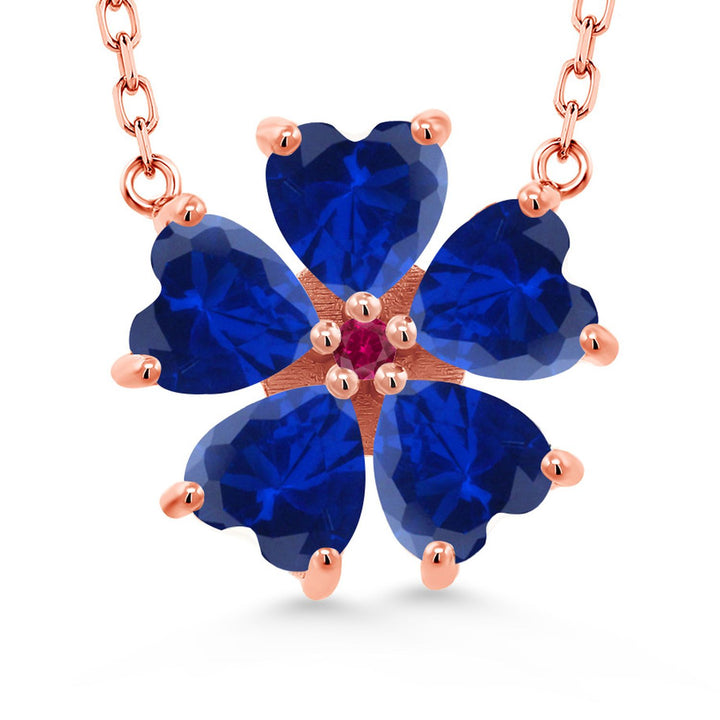 Gem Stone King 925 Sterling Silver Gemstone Birthstone and Created Ruby Flower Pendant Necklace for Women | Heart Shape 6MM Petals and Round 2MM Center | With 18 Inch Chain | Fine Jewelry for Her Mom Wife