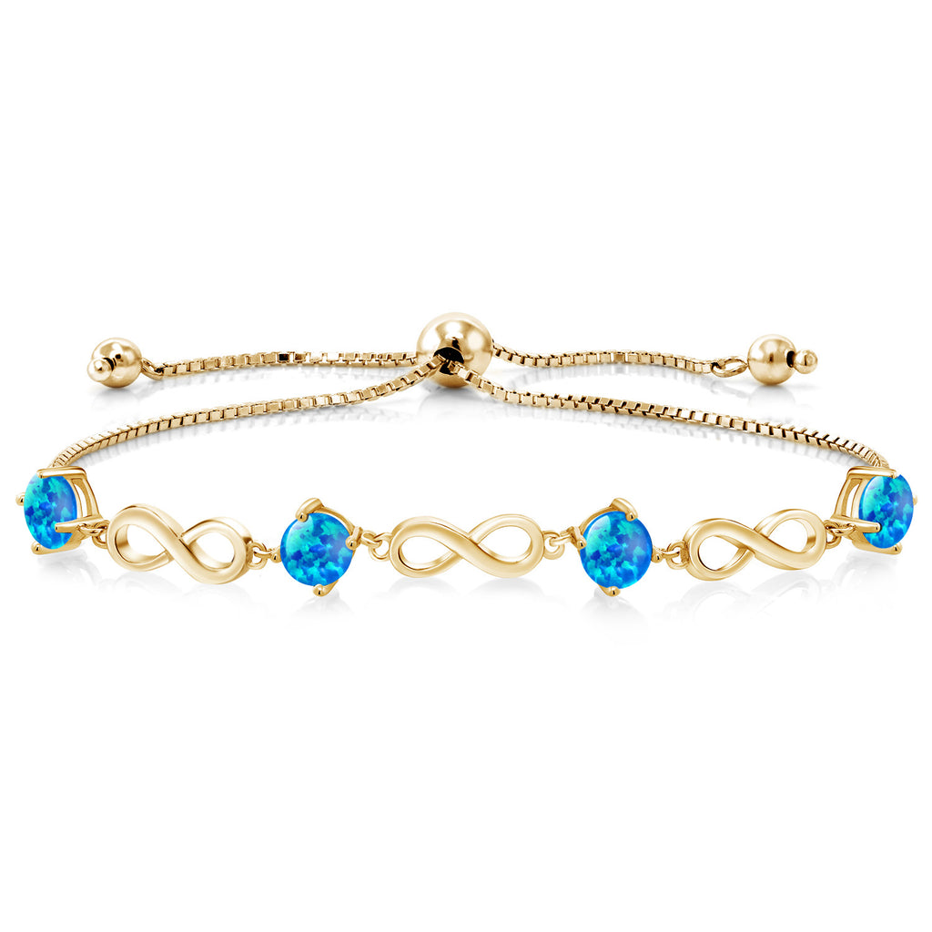 Blue Simulated Opal-Cabochon - October_Bracelet in 925 Yellow Gold Plated Silver