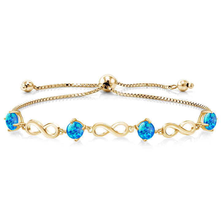 Blue Simulated Opal-Cabochon - October_Bracelet in 925 Yellow Gold Plated Silver