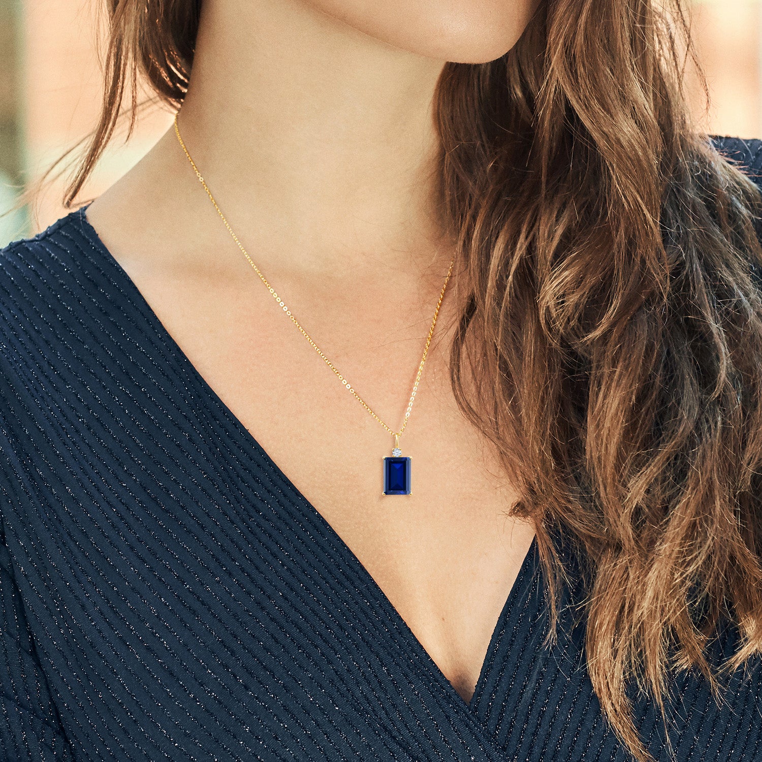 18K Yellow Gold Plated Silver Blue Created Sapphire Pendant Necklace For Women (10.11 Cttw, Emerald Cut 14X10MM, with 18 Inch Chain)