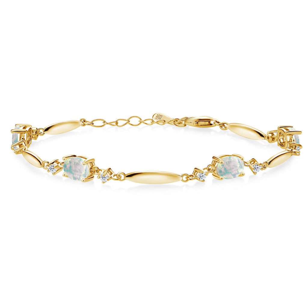 White Simulated Opal-Cabochon - October_Bracelet in 925 Yellow Gold Plated Silver