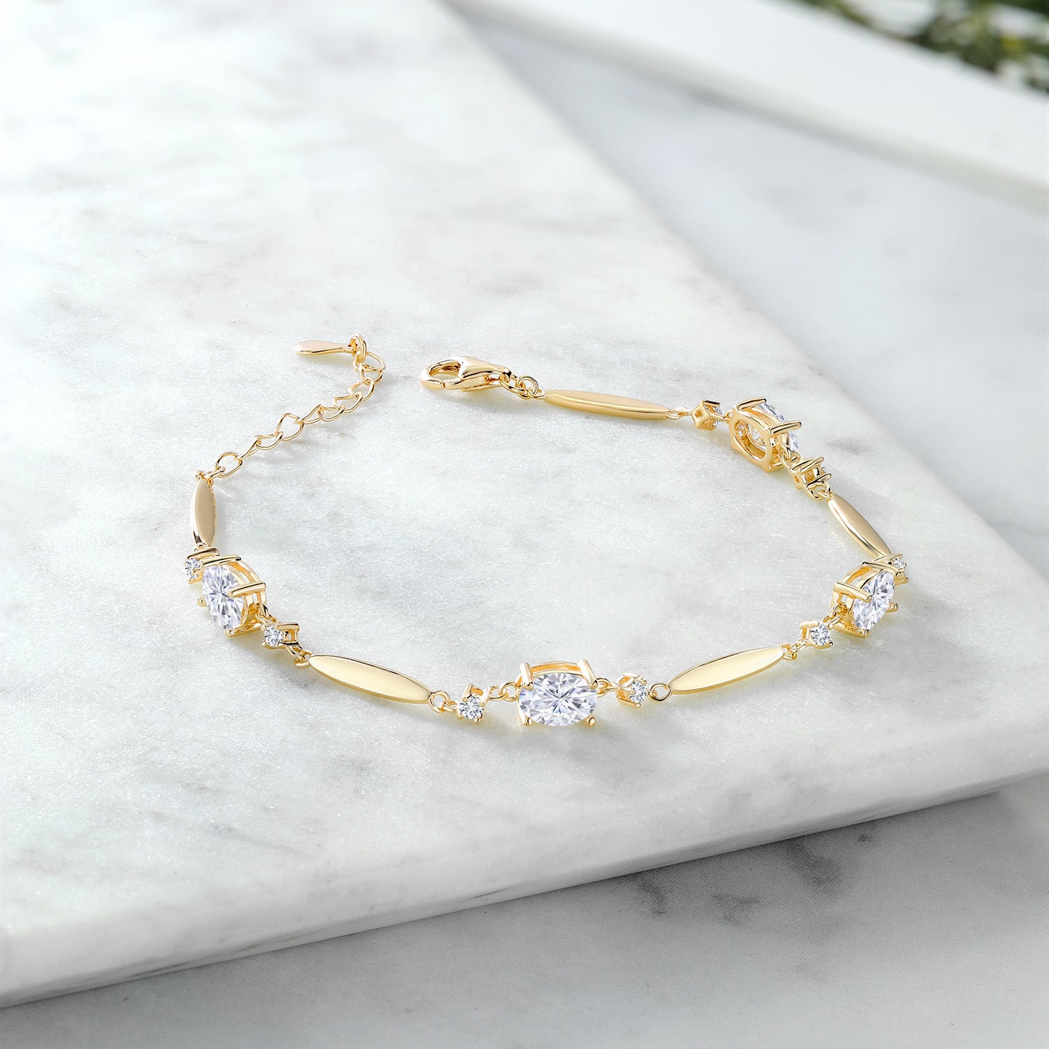 18K Yellow Gold Plated Silver White Moissanite and White Lab Grown Diamond Tennis Bracelet For Women | 3.90 Cttw | Gemstone | Oval 7X5MM | 6 Inch + 1 Inch Extender