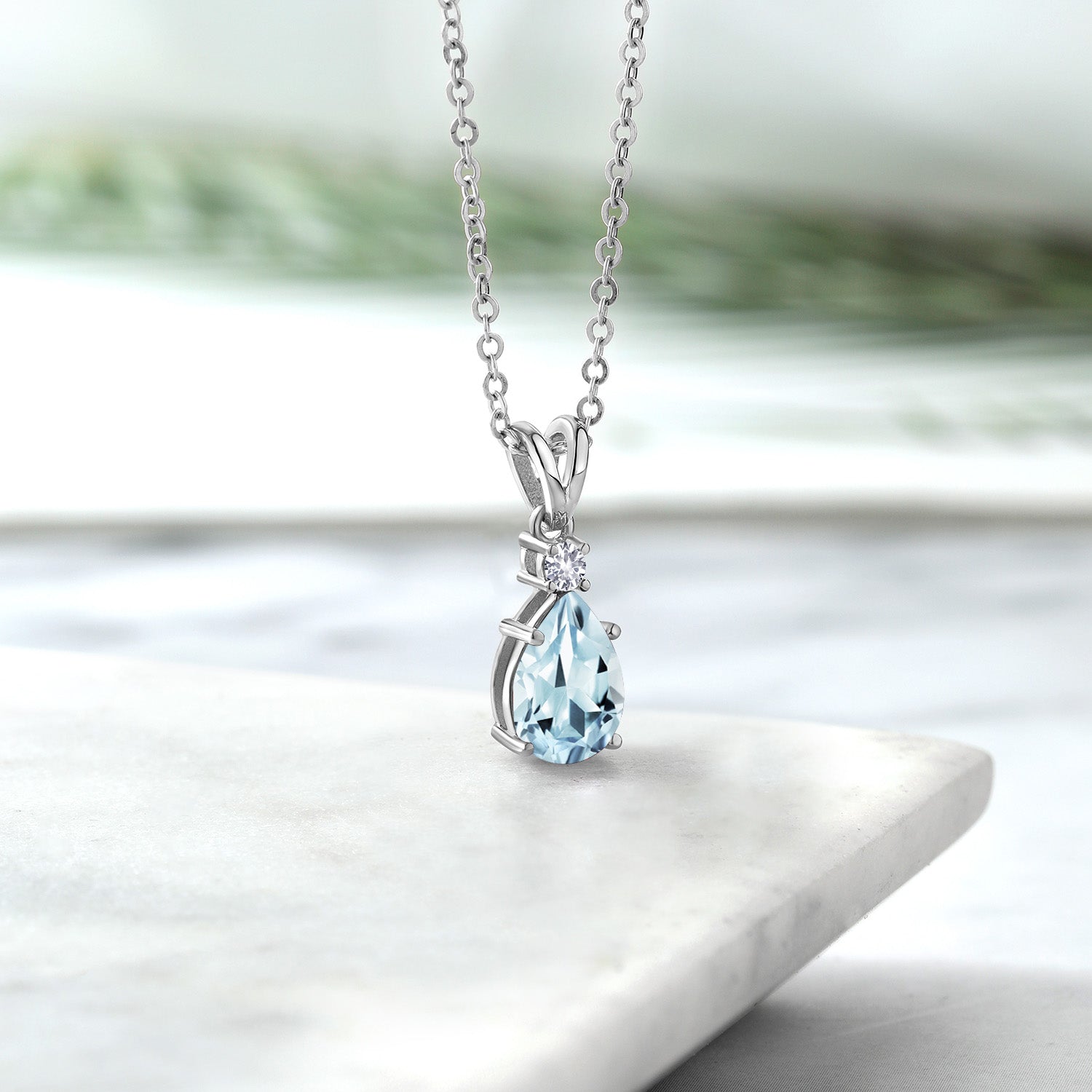 925 Sterling Silver Sky Blue Aquamarine and White Created Sapphire Pendant Necklace For Women (1.21 Cttw, Gemstone March Birthstone, Pear Shape 9X6MM, with 18 inch Chain)