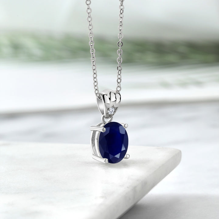 925 Sterling Silver Blue Sapphire and Moissanite Pendant Necklace For Women (4.54 Cttw, Oval 11X9MM with 18 Inch Silver Chain)