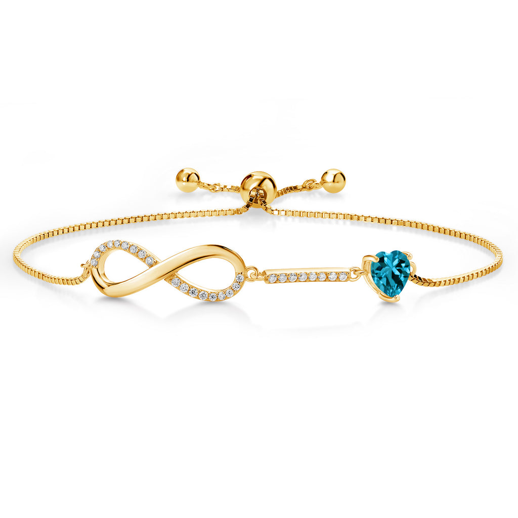 Gem Stone King 18K Yellow Gold Plated Silver Heart Shape 6MM Gemstone Birthstone and White Moissanite Infinity Tennis Bracelet For Women | Adjustable Bolo Bracelet For Women | Easy-On Easy-Off