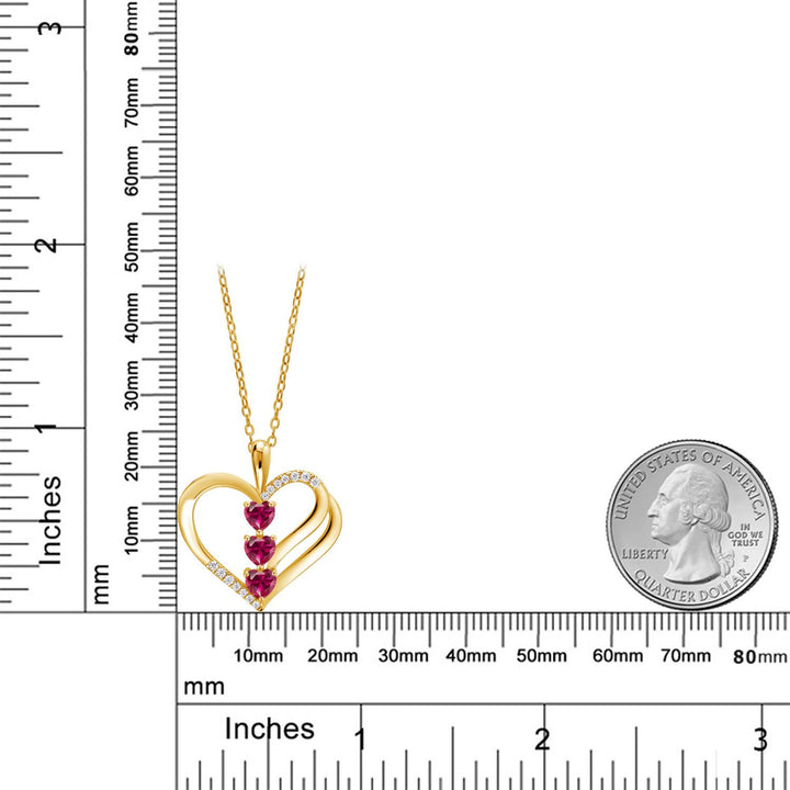 18K Yellow Gold Plated Silver Red Created Ruby and White Moissanite 3-Stone Pendant Necklace For Women (1.00 Cttw, Gemstone July Birthstone, Heart Shape 4MM, with 18 Inch Silver Chain)