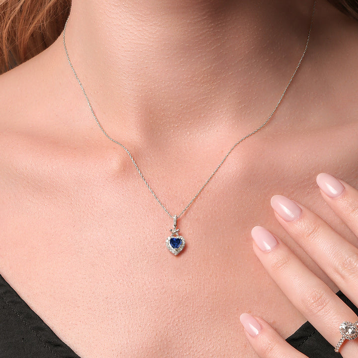 10K White Gold Blue Created Sapphire and White Lab Grown Diamond Pendant Necklace For Women (0.61 Cttw, Heart Shape 5MM, with 18 Inch Chain)