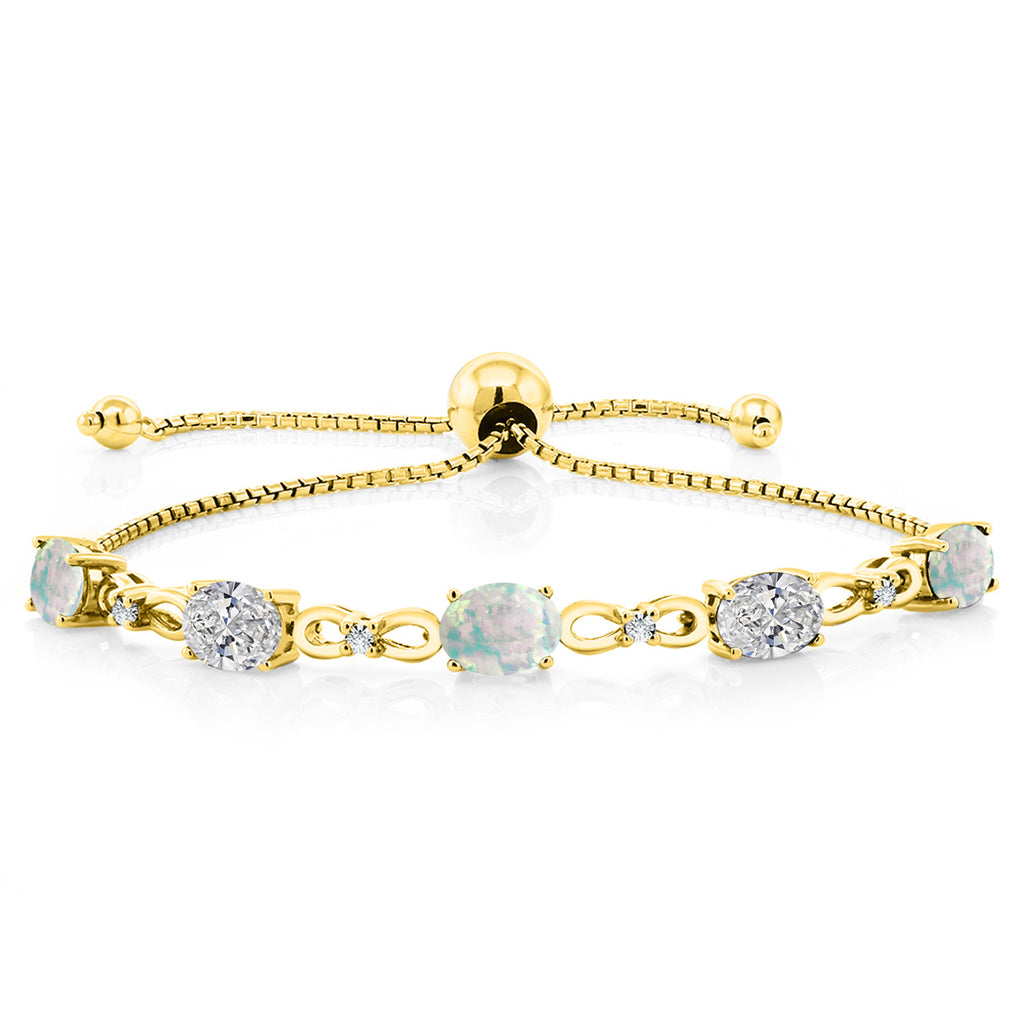White Simulated Opal-Cabochon - October_Bracelet in 925 Yellow Gold Plated Silver
