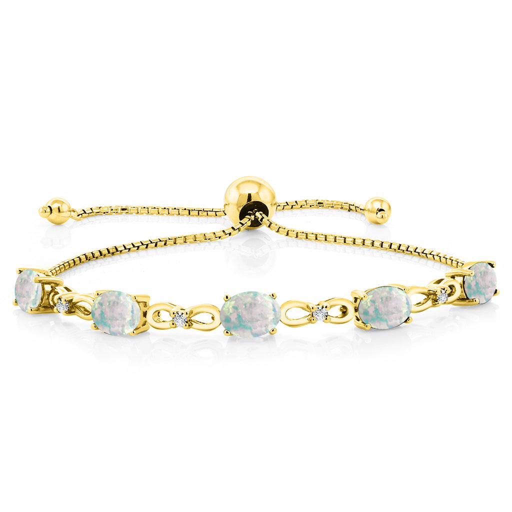 White Simulated Opal-Cabochon - October_Bracelet in 925 Yellow Gold Plated Silver