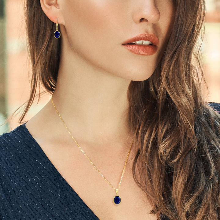 18K Yellow Gold Plated Silver Blue Sapphire Pendant and Earrings Jewelry Set For Women (10.00 Cttw, Oval Gemstone Birthstone, with 18 Inch Chain)