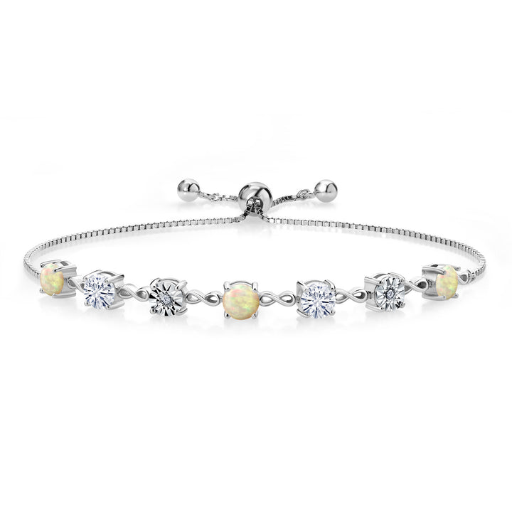 Gem Stone King Gemstone Birthstone White Moissanite and Lab Grown Diamond Accent Infinity Tennis Bracelet for Women in 925 Sterling Silver | Round 5MM and 1MM | Adjustable Bolo Up to 9 Inch | Easy-On Easy-Off