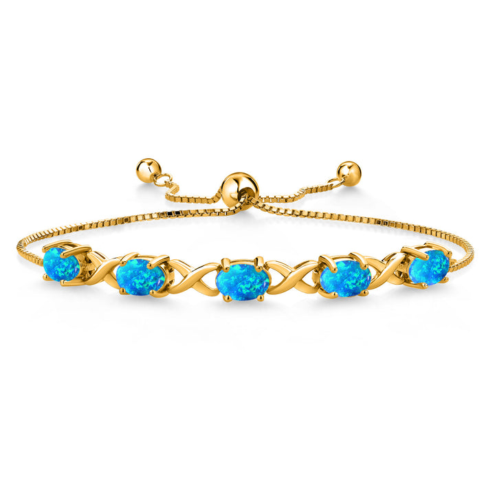 Blue Simulated Opal - October_Bracelet in 925 Yellow Gold Plated Silver