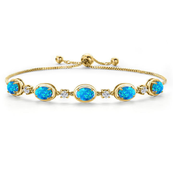 Blue Simulated Opal - October_Bracelet in 925 Yellow Gold Plated Silver