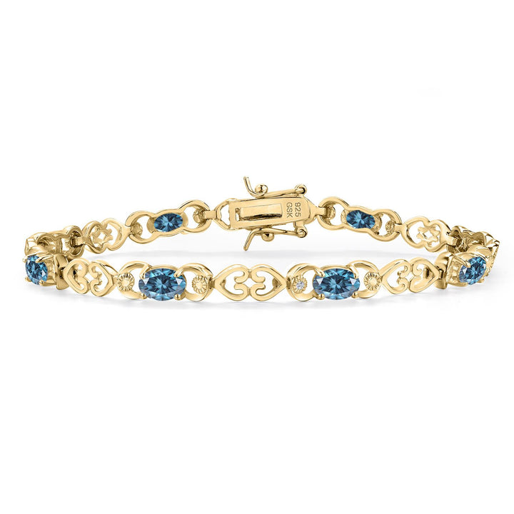 Persian Blue Moissanite - April_Bracelet in 925 Yellow Gold Plated Silver