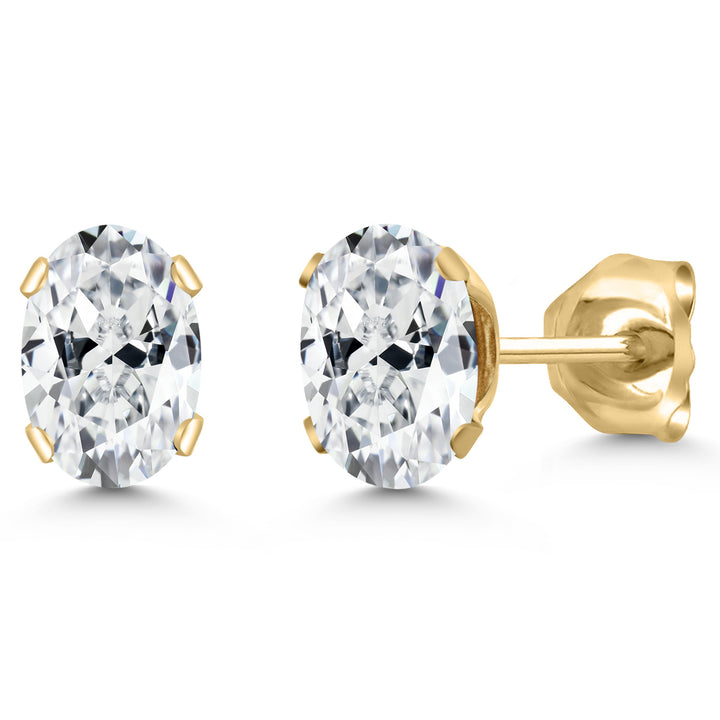 Oval-cut clear gemstone stud earrings set in four-prong yellow gold-plated settings with push backs