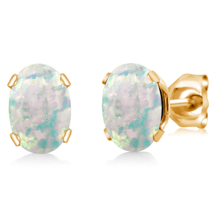 White Simulated Opal-Cabochon - October_Earrings in yellow gold plated brass